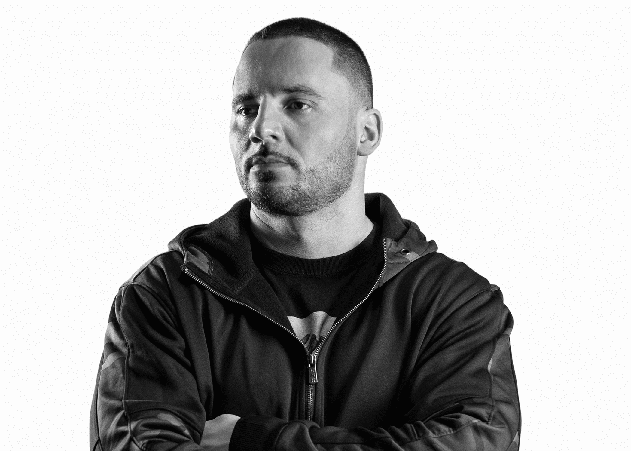 DJ NVious performing live behind the decks, focused on mixing an open-format set.