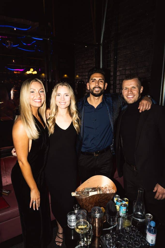 Stylish couple enjoying an anniversary date night at Side Bar